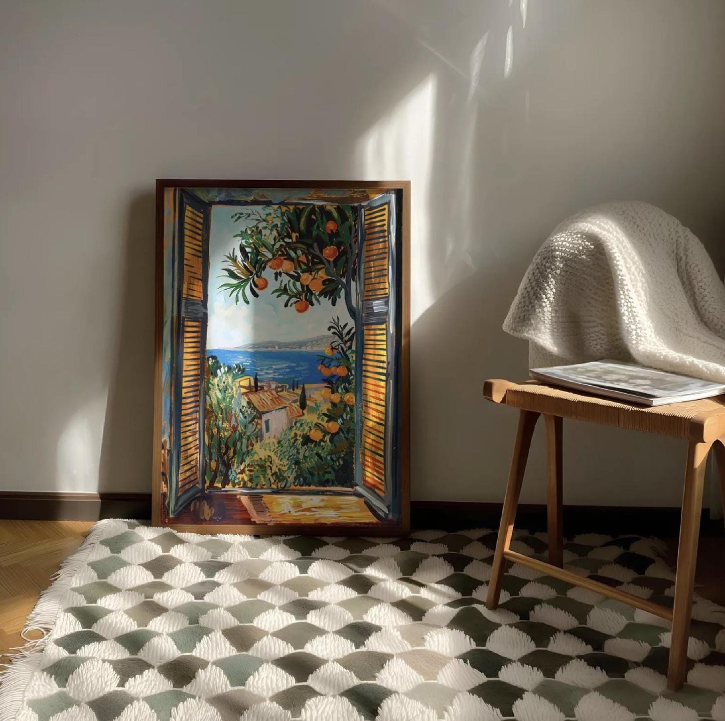 An impressionistic painting capturing a vibrant coastal view through an open window with orange louvered shutters. An orange tree laden with ripe fruit and lush green leaves frames the top right of the window. Beyond the window, a brilliant blue sea stretches to the horizon, meeting a distant coastline with buildings. In the midground, a terracotta-roofed building is nestled among vibrant green and yellow foliage. The brushstrokes are loose and expressive creating a dynamic and bright atmosphere