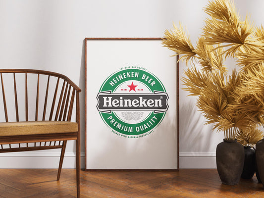 A sharp, bold art print featuring the iconic Heineken beer logo. The design prominently displays the vibrant green background, the distinct red star, and the crisp white 'Heineken' typography. This clean, graphic representation of the famous beverage brand is perfect for modern bar decor, a stylish man cave, pub wall art, or a contemporary kitchen. It's an ideal digital print gift for any Heineken enthusiast or collector of iconic beer branding, adding a sleek touch to any space.