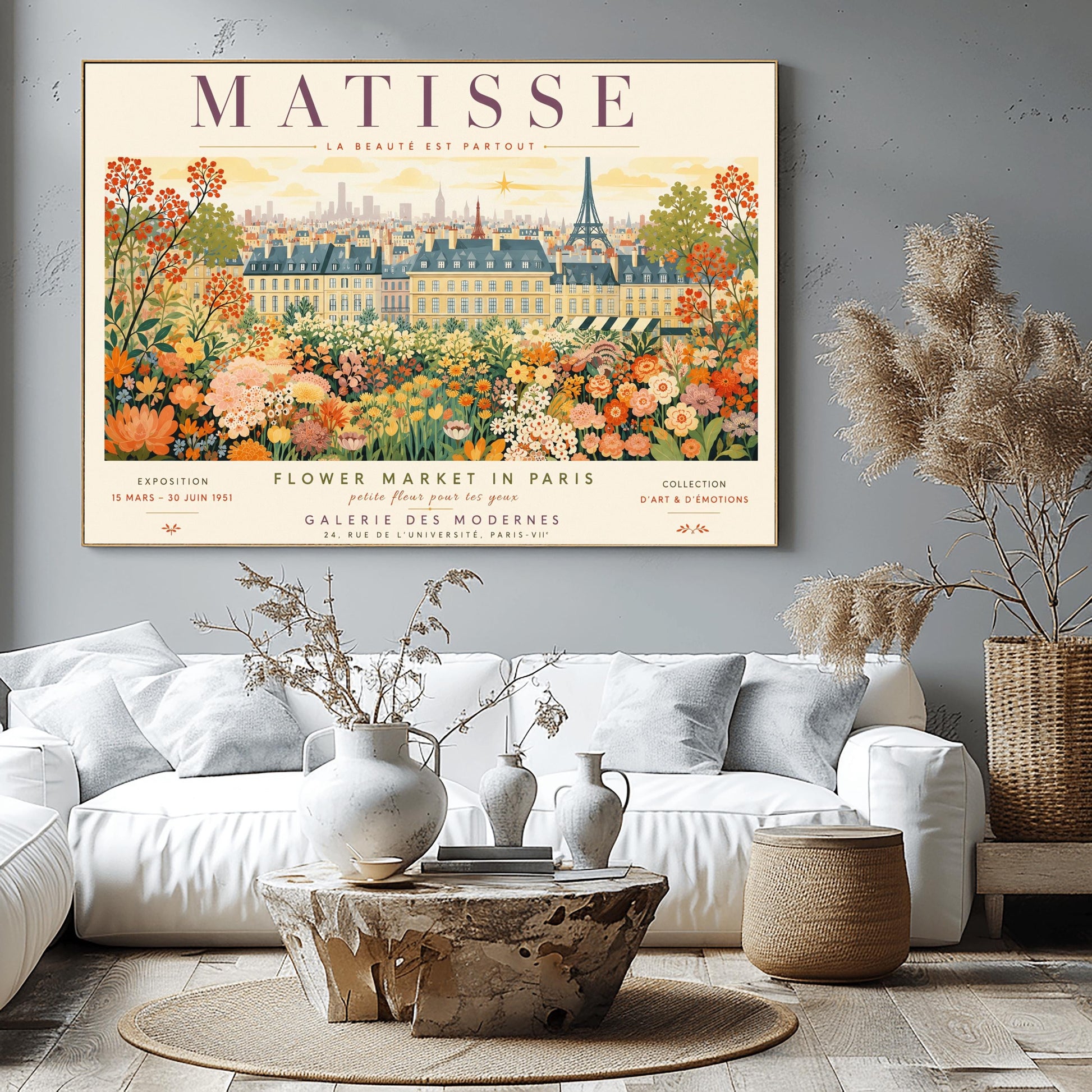 A French art exhibition poster titled "MATISSE" across the top. The central illustration shows a sprawling field of dense, colorful wildflowers in shades of orange, yellow, and white. In the background, classic Parisian buildings and the silhouette of the Eiffel Tower stand under a soft yellow sky. The text at the bottom reads "Flower Market in Paris, Galerie des Modernes, 24, Rue de l'Université, Paris."