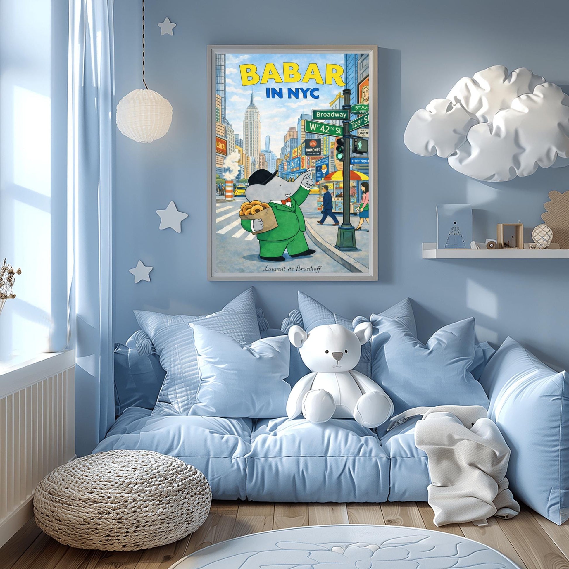 A vertical children's illustration poster titled "BABAR IN NYC." At the center is Babar the elephant wearing a green suit and black bowler hat, holding a brown bag of bagels. He is standing on a busy New York City street corner next to a sign for Broadway and W 42nd St. Behind him is the Empire State Building and colorful Times Square billboards. The name "Laurent de Brunhoff" is at the bottom.