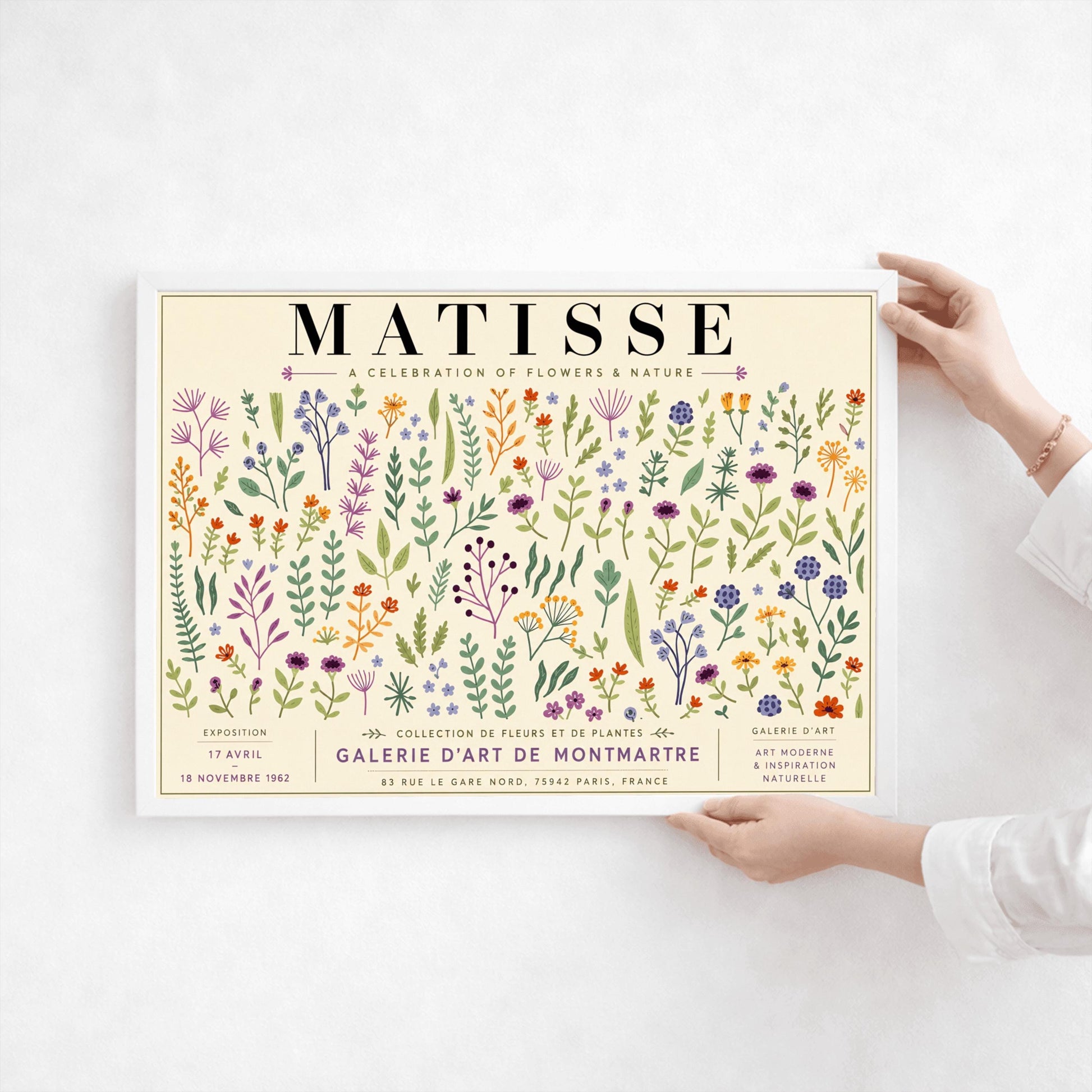 A vertical gallery exhibition poster with a warm cream border. Bold black text at the top reads "HENRI MATISSE". The central artwork is a rectangular block with a solid sand-beige background, featuring a cream silhouette of an abstract, four-petaled flower with a circular center.