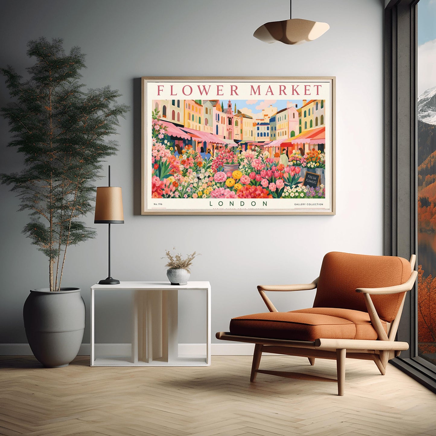 A vintage-style exhibition poster titled "FLOWER MARKET" at the top and "LONDON" at the bottom. The illustration depicts a vibrant open-air market scene packed with dense stalls of pink tulips, yellow ranunculus, and assorted green foliage. In the background, a row of colorful, multi-story pastel buildings stands under a light blue sky with soft white clouds, with shoppers walking between the stalls.