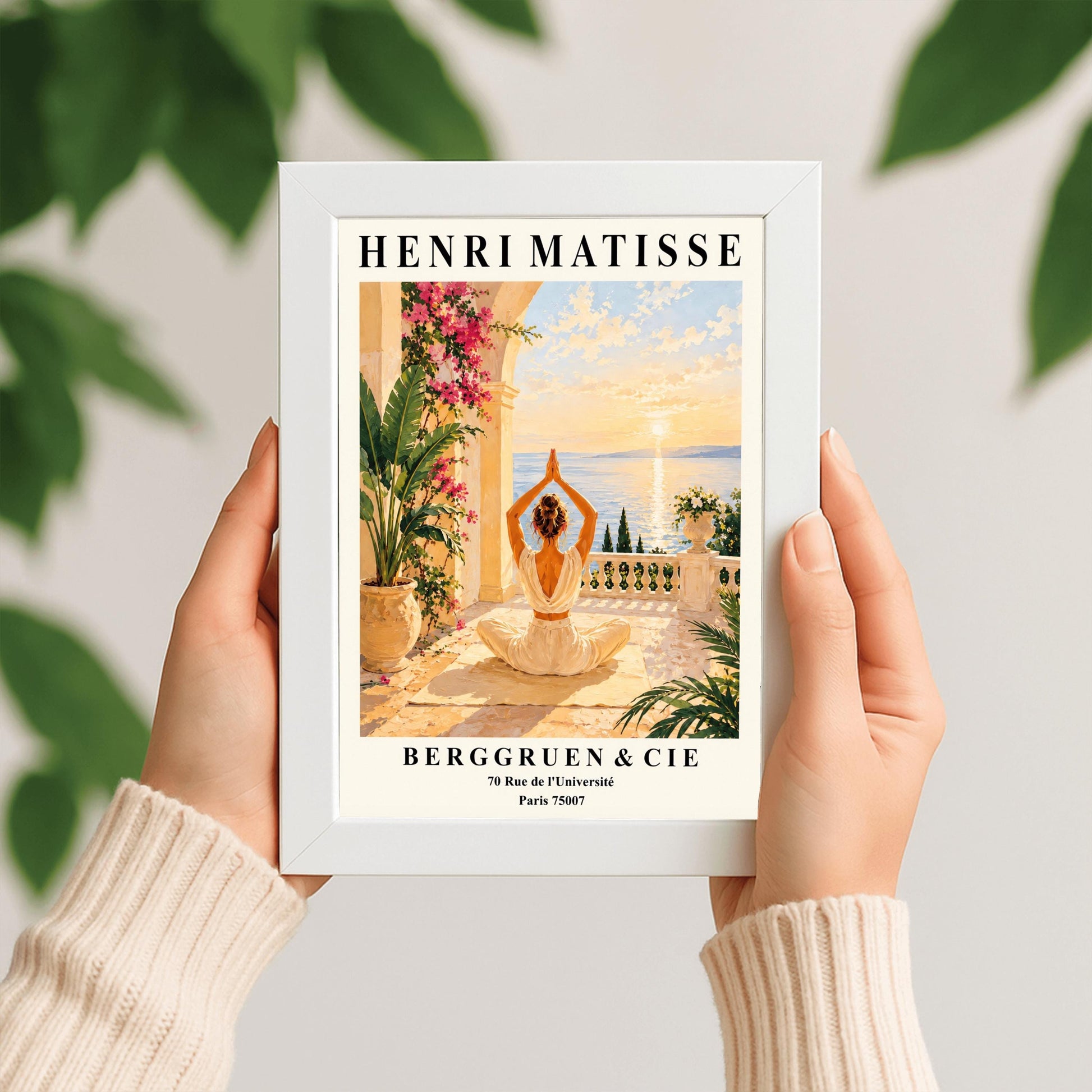 Henri Matisse style poster featuring a woman meditating in a yoga pose on a Mediterranean terrace overlooking the sea at sunset, surrounded by tropical plants, pink flowers, elegant architecture, and warm golden coastal scenery.