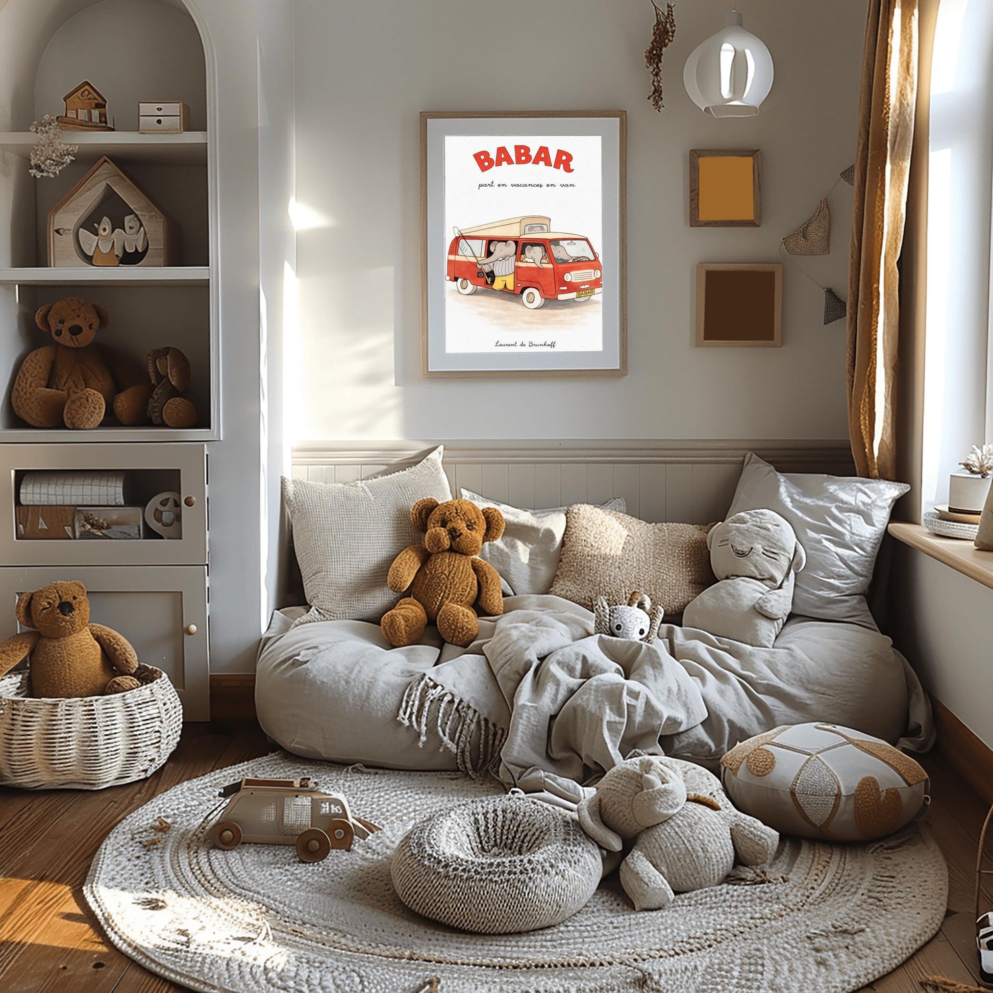 A vertical art print titled "BABAR part en vacances en van" in large red letters. A retro red and cream camper van is filled with grey elephants. One elephant in a striped shirt holds a fishing rod out the side door, and another sits in the driver's seat. The van has a "BABAR" license plate and a gold crown symbol on the grill. The artist's name, "Laurent de Brunhoff," is at the bottom of the cream-colored, textured background.