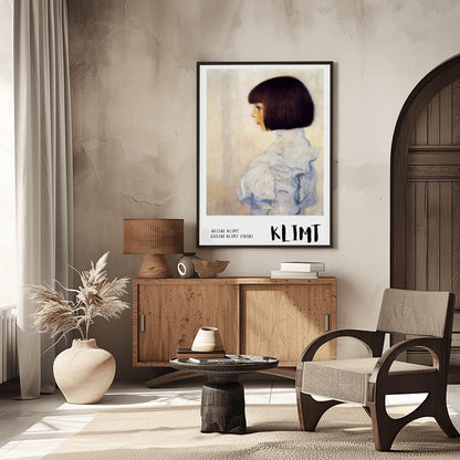 A vertical museum exhibition poster featuring Gustav Klimt's 1898 portrait of "Helene Klimt." A young girl with a dark bob haircut is shown in profile wearing a high-collared white lace blouse. The background is a muted cream. The bottom border is light grey with bold black text reading "HELENE KLIMT" and "KLIMT."