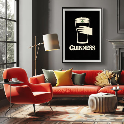 A vertical minimalist graphic design on a textured black background. A cream-colored hand is shown holding a pint of Guinness stout, with the glass itself created out of negative space. A small green shamrock is on the foam. The word "GUINNESS" is in cream text at the bottom.