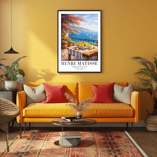 A vertical painterly illustration of a stone terrace with a black iron railing. A pink bougainvillea tree hangs from the top left over a wooden table with a bowl of oranges and lemons. Beyond the railing is a blue sea with white sailboats and a distant mountainous coastline.