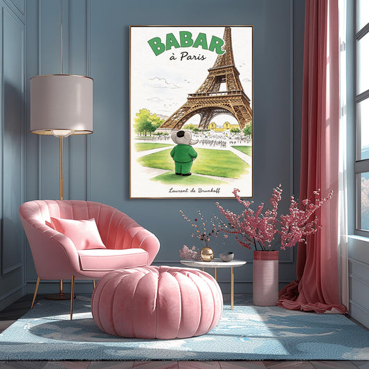 A vertical art print titled "BABAR à Paris" in large green letters. A grey elephant, Babar, seen from behind wearing a green suit and black cap, stands on a green lawn looking toward the massive Eiffel Tower. The scene includes green trees, a distant cityscape with crowds of people, and a soft blue sky. The artist's name, "Laurent de Brunhoff," is printed in script at the bottom.
