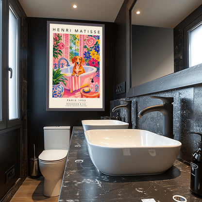A vertical maximalist art print styled as a Henri Matisse exhibition poster. A brown Dachshund dog sits in a pink bathtub while water pours from a silver faucet. The room features vibrant pink walls and floors, decorated with very large pink, blue, and yellow flowers. A blue and white floral pot sits in the foreground along with a small stool holding soap and bottles. An open window in the background shows a blue sea and green leaves.