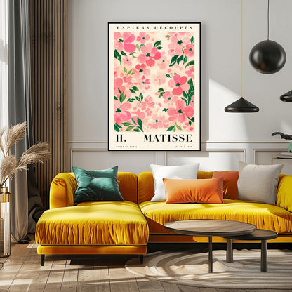 A vertical art print styled as a Henri Matisse exhibition poster. The central image is a dense pattern of soft pink and rose-colored flowers with dark green leaves on a cream-colored background. The flowers are painted with visible, textured brushstrokes. Above the image, the words "PAPIERS DÉCOUPÉS" are written in a black serif font. Below the image, the text reads "H. MATISSE" in large letters, with "ECOLE DE PARIS" and "FRANCE 1890" in smaller text at the bottom.