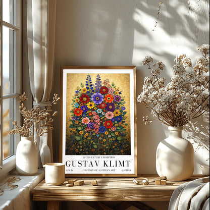 A vertical art print in the style of Gustav Klimt featuring a dense bouquet of colorful wildflowers. The flowers, including red, purple, and orange zinnias and tall blue delphiniums, are rendered as intricate mosaics with geometric patterns. The entire arrangement is set against a shimmering, gold-tiled background that glows with metallic light. The style is highly decorative, maximalist, and vibrant.