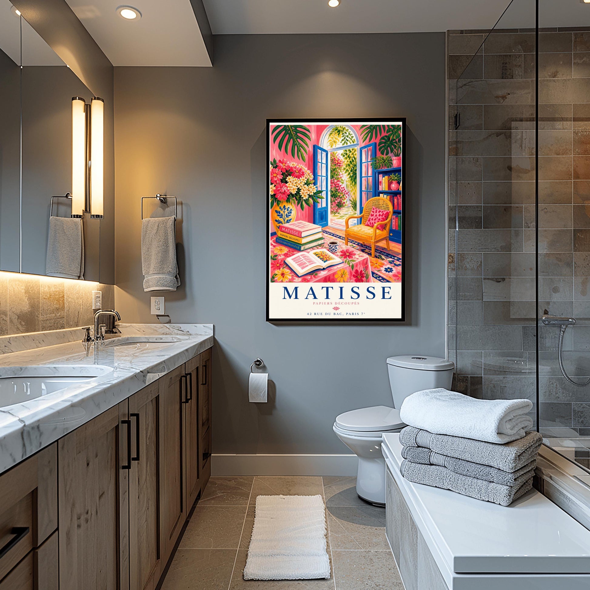A vertical maximalist art print styled as a Henri Matisse exhibition poster. The scene shows a vibrant interior reading room with hot pink walls and cobalt blue French doors open to a sunlit garden. A yellow cane chair sits next to a bookshelf. In the foreground, a table covered in a pink floral cloth holds a stack of art books, an open book, and a blue coffee mug. Large monstera leaves and various flowers frame the room. Bold black and red text at the bottom reads "MATISSE PAPIERS DÉCOUPÉS"