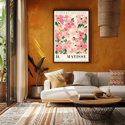 A vertical art print styled as a Henri Matisse exhibition poster. The central image is a dense pattern of soft pink and rose-colored flowers with dark green leaves on a cream-colored background. The flowers are painted with visible, textured brushstrokes. Above the image, the words "PAPIERS DÉCOUPÉS" are written in a black serif font. Below the image, the text reads "H. MATISSE" in large letters, with "ECOLE DE PARIS" and "FRANCE 1890" in smaller text at the bottom.