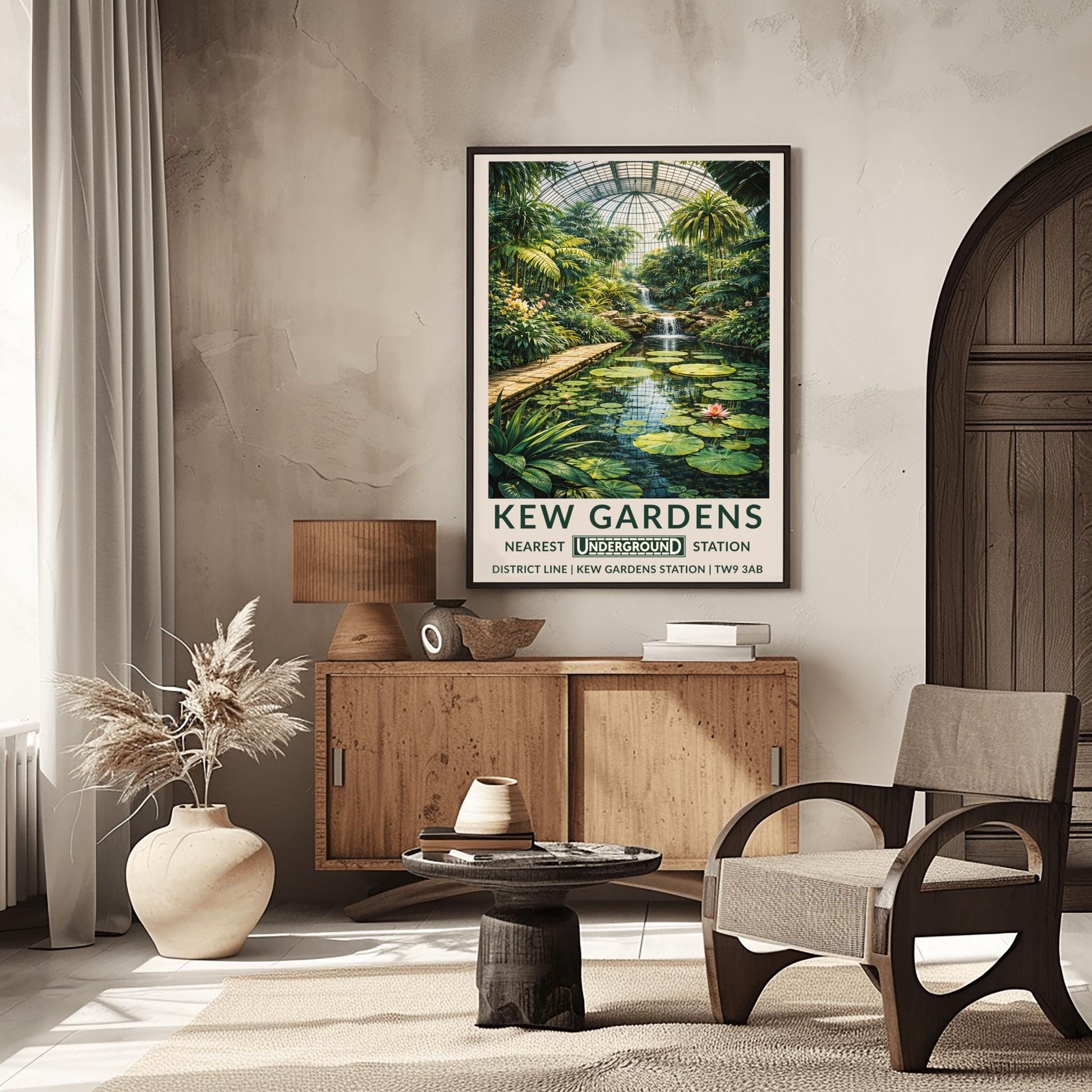 A vertical vintage-style travel poster for Kew Gardens. The artwork depicts the interior of a massive glass conservatory filled with dense tropical plants and tall palm trees. In the foreground, a calm pond features large green lily pads and pink flowers. A stone walkway runs alongside the pond leading toward a multi-tiered waterfall in the center. The scene is topped by a large, grid-patterned glass dome.