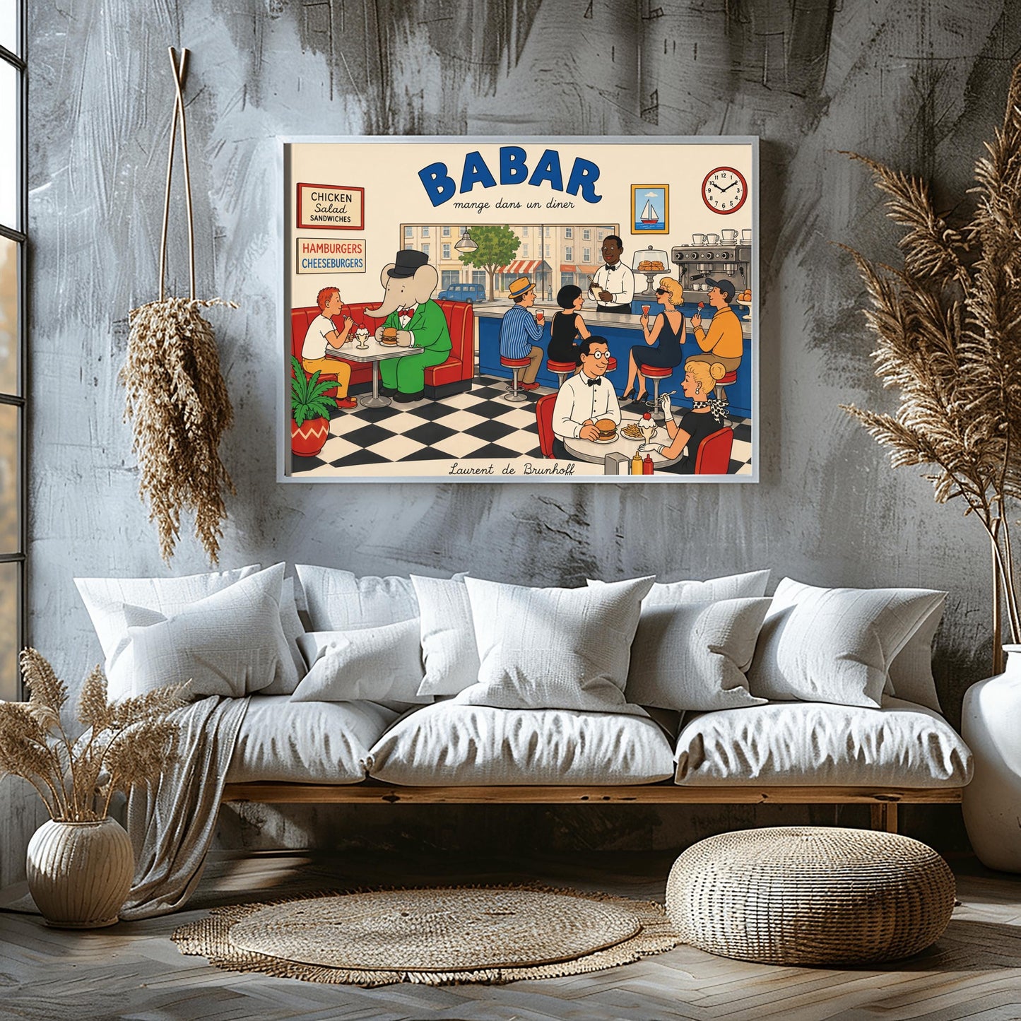 A colorful 1950s-style illustration poster titled "BABAR mange dans un diner" in bold blue and black lettering. The scene shows the interior of a lively retro diner with a black-and-white checkered floor. On the left, the cartoon elephant King Babar sits in a red leather booth wearing a green suit and top hat while eating a burger. Patrons sit at a long blue counter on stools and around tables eating burgers and sundaes, while a waiter takes orders.