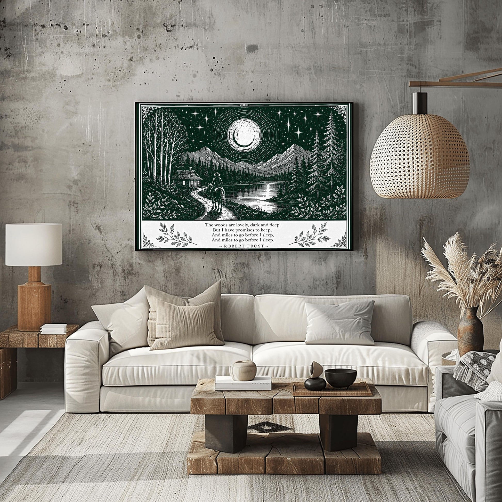 A wide horizontal art print in forest green and cream. A person on horseback follows a path toward a small cabin by a lake. In the background are tall pine forests and sharp mountain peaks under a massive moon and starry sky. The bottom of the print contains four lines of Robert Frost’s poetry in clean serif text, flanked by simple leaf illustrations.