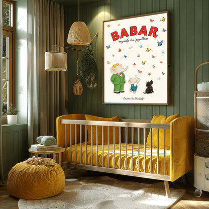 A vertical retro fine art exhibition poster titled "BABAR regarde les papillons" on a wide cream border. The top "BABAR" text is printed in a bold red font. The illustration shows an elephant wearing a crown and green suit standing next to a smaller elephant reaching up toward a sky filled with dozens of colorful blue, yellow, orange, and white butterflies. A small black dog sits patiently on the ground looking up at them. The name "Laurent de Brunhoff" anchors the bottom.
