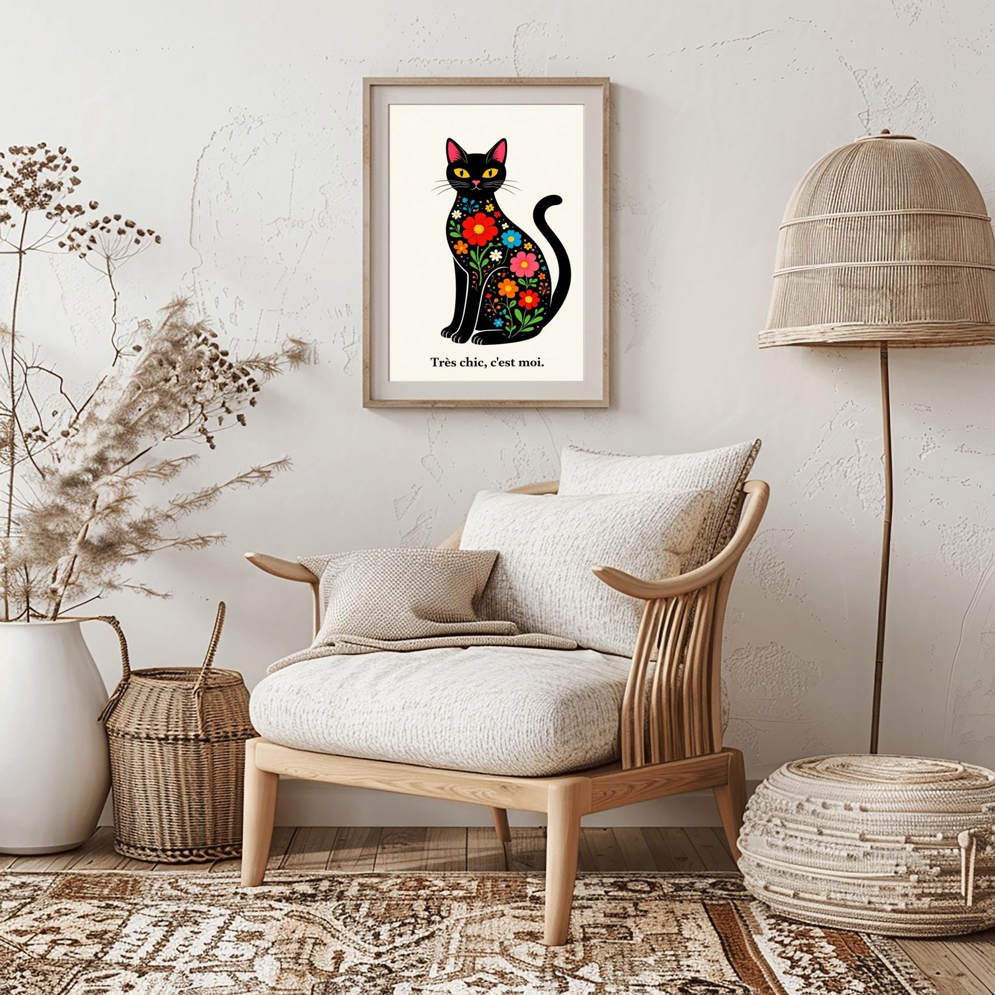 A vertical minimalist art print of a sleek black cat sitting upright, facing forward. The cat's body is filled with colorful folk-art style flowers in red, blue, orange, and yellow with green leaves. The cat has large yellow eyes and a small pink nose. Below the cat, the French phrase "Très chic, c'est moi." is written in a black serif font. The entire image is set against a textured off-white background.