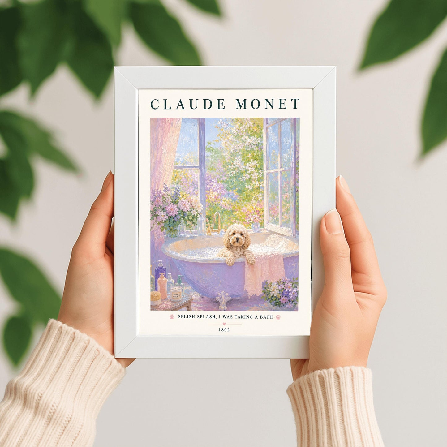 A vertical art print in a soft impressionist style. A small, fluffy, cream-colored dog sits in a lavender-colored bathtub filled with soapy bubbles. The tub is by an open window overlooking a sunlit garden of pink and purple flowers. The top of the print says "CLAUDE MONET" in a dark serif font. The bottom features the text "SPLISH SPLASH, I WAS TAKING A BATH" with small pink paw prints.