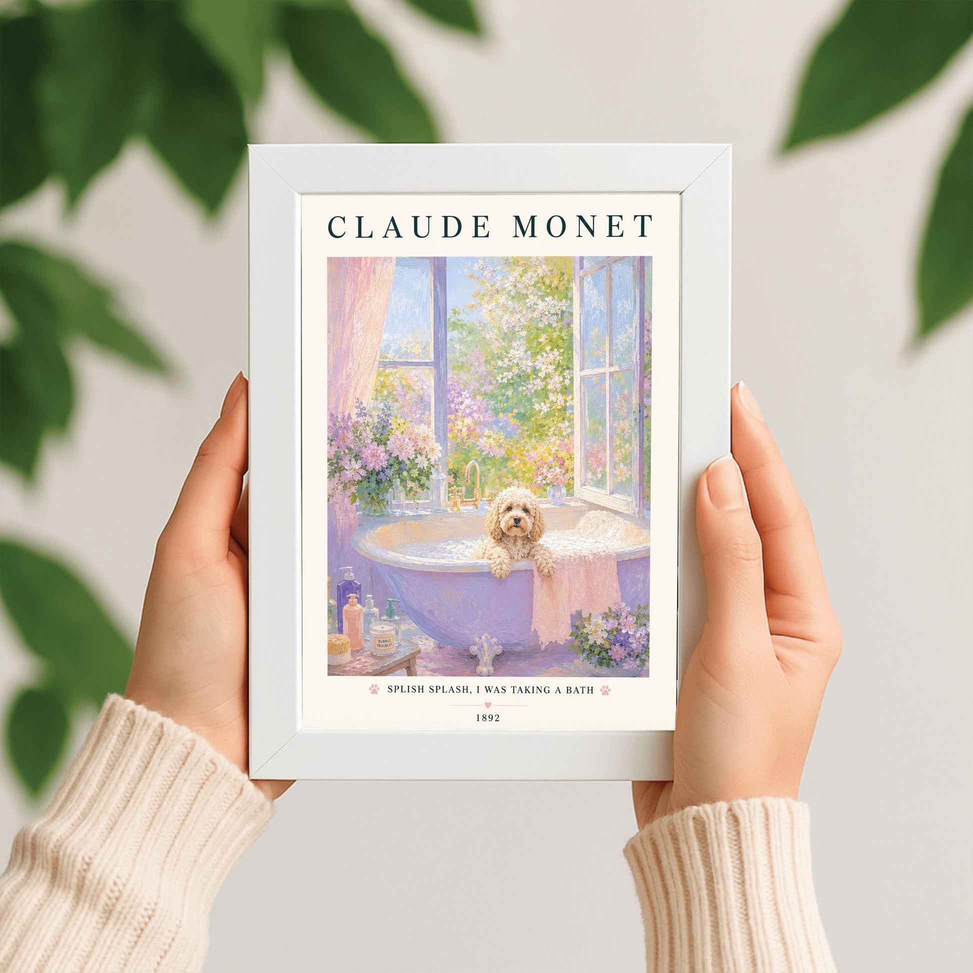 A vertical art print in a soft impressionist style. A small, fluffy, cream-colored dog sits in a lavender-colored bathtub filled with soapy bubbles. The tub is by an open window overlooking a sunlit garden of pink and purple flowers. The top of the print says "CLAUDE MONET" in a dark serif font. The bottom features the text "SPLISH SPLASH, I WAS TAKING A BATH" with small pink paw prints.