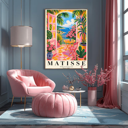 A vertical maximalist art print styled as a Henri Matisse exhibition poster. The scene features a vibrant balcony with pink-framed glass doors open to a view of the blue Mediterranean sea and a coastal town. The balcony has pink and yellow checkered tiles, a yellow round table with a pink chair, and is filled with tropical plants and pink flowers in blue and white vases. A sailboat is visible on the water under a bright blue sky with white clouds.
