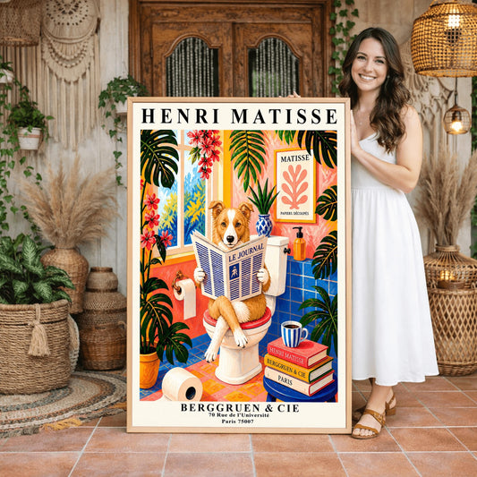 A vertical retro French exhibition poster styled after Henri Matisse with a wide ivory border. The central image shows a vibrant, colorful bathroom illustration. A fluffy ginger-and-white border collie dog sits on a white toilet, holding and reading a newspaper titled "LE JOURNAL". The bathroom features cobalt blue floor and wall tiles, bright pink walls, and large green monstera plants.