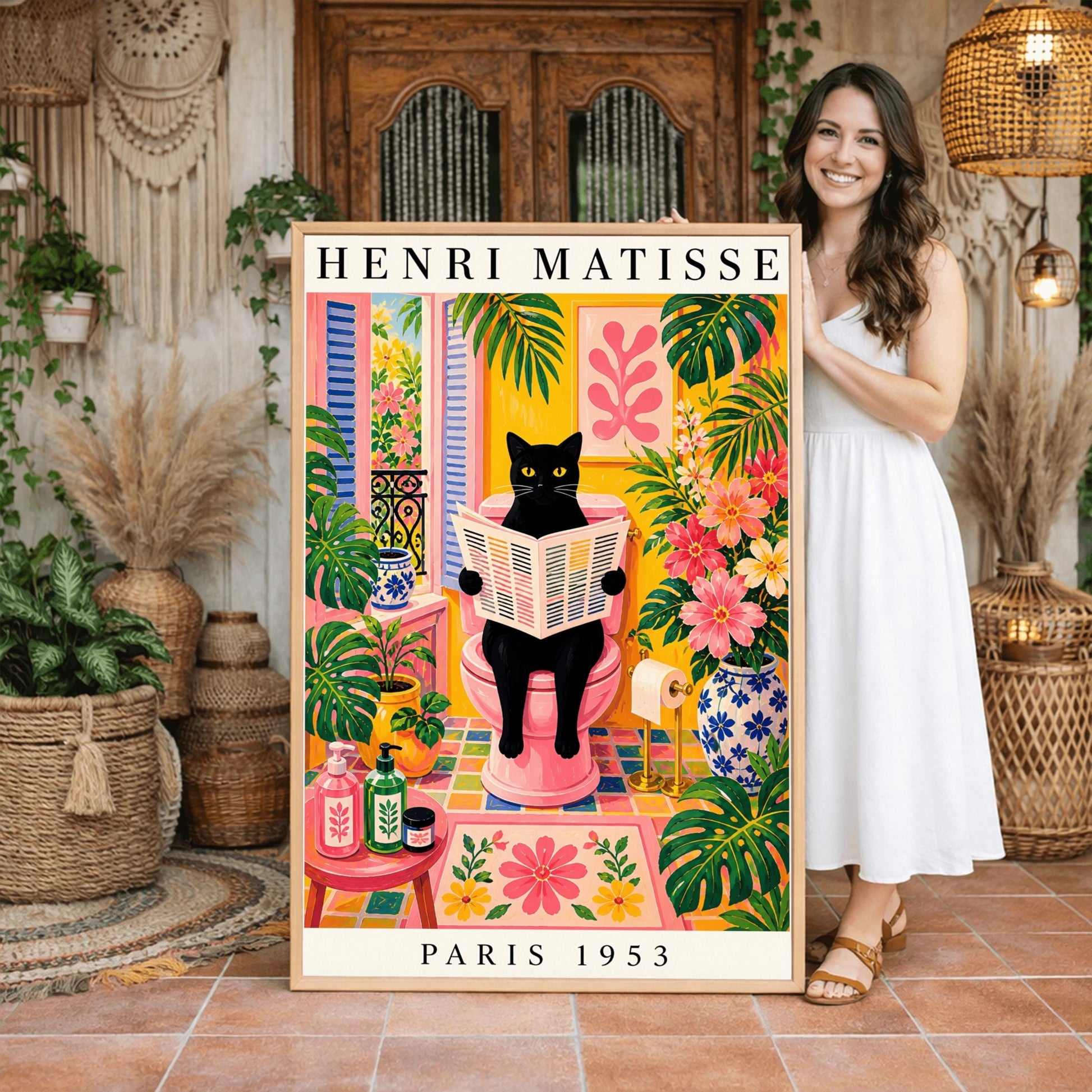 A vertical maximalist art print styled as a Henri Matisse exhibition poster. A sleek black cat with bright yellow eyes sits on a pink toilet, holding and reading a newspaper. The bathroom is filled with vibrant yellow walls, pink and yellow checkered tiles, and lush green monstera plants. A window with blue shutters looks out onto a garden. A pink bath mat and blue floral vases add more color. Bold black text at the top reads "HENRI MATISSE" and at the bottom "PARIS 1953".