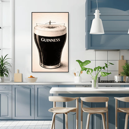 A vertical charcoal-style illustration of a pint of Guinness. A tiny silhouette of a person balances on a tightrope stretched across the white foam at the top of the glass. The body of the beer is deep black with the word "GUINNESS" in white. The background is a light, textured cream.