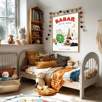 A vertical retro fine art exhibition poster titled "BABAR fait du camping" on a wide cream border. The top "BABAR" text is printed in a bold red font. The illustration shows an elephant in a green suit and red bowtie sitting on a stool by a campfire, toasting a marshmallow next to a white tent under a starry night sky with a yellow crescent moon. A small black dog in a plaid scarf sleeps nearby, and the name "Laurent de Brunhoff" anchors the bottom.