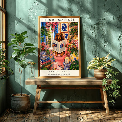 A vertical vintage-style art exhibition poster titled "HENRI MATISSE" at the top and "PARIS 1953 BERGGRUEN & CIE" at the bottom. The main image features a long-haired brown Dachshund dog sitting on a pink toilet inside an incredibly ornate bathroom, reading a newspaper titled "LE JOURNAL DES ANIMAUX". The background is a dense, colorful display of patterned wall tiles, framed Matisse paper cutouts, large green tropical houseplants, and vases full of pink lilies and flowers.