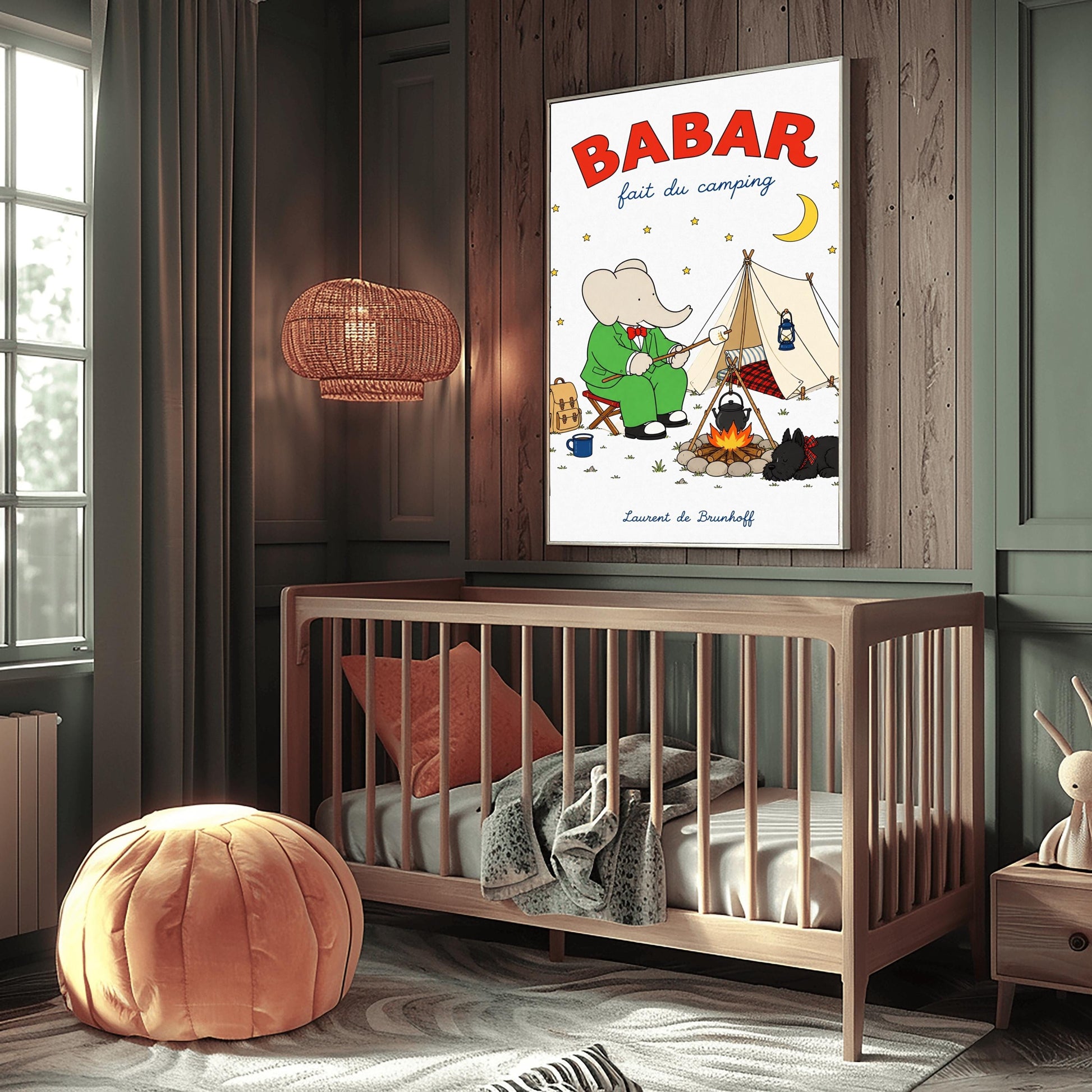 A vertical retro fine art exhibition poster titled "BABAR fait du camping" on a wide cream border. The top "BABAR" text is printed in a bold red font. The illustration shows an elephant in a green suit and red bowtie sitting on a stool by a campfire, toasting a marshmallow next to a white tent under a starry night sky with a yellow crescent moon. A small black dog in a plaid scarf sleeps nearby, and the name "Laurent de Brunhoff" anchors the bottom.