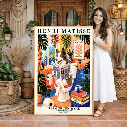 A vertical retro French exhibition poster styled after Henri Matisse with a wide ivory border. The central image shows a vibrant bathroom illustration where a fluffy brown-and-white border collie dog sits upright on a white toilet, holding and reading a newspaper titled "LE JOURNAL" with a happy, alert expression. The room features cobalt blue floor and wall tiles, coral pink walls, and large potted monstera plants with cascading pink flowers