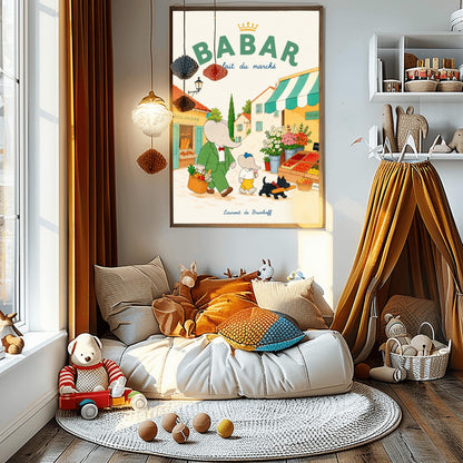A vertical storybook-style art print of Babar the Elephant walking through a French village street. Babar, in a green suit, carries a basket of groceries. A smaller elephant walks beside him eating a pink ice cream cone, followed by a black dog carrying a baguette. The background features a boulangerie with a yellow facade, a flower stall with pink and white roses, and terracotta-roofed houses under a cream sky. The top reads "BABAR fait du marché" with a gold crown.