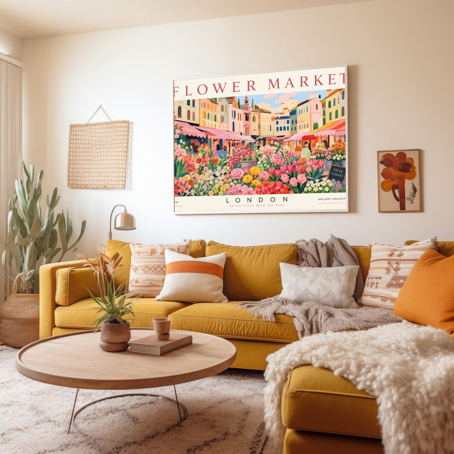A vintage-style exhibition poster titled "FLOWER MARKET" at the top and "LONDON" at the bottom. The illustration depicts a vibrant open-air market scene packed with dense stalls of pink tulips, yellow ranunculus, and assorted green foliage. In the background, a row of colorful, multi-story pastel buildings stands under a light blue sky with soft white clouds, with shoppers walking between the stalls.