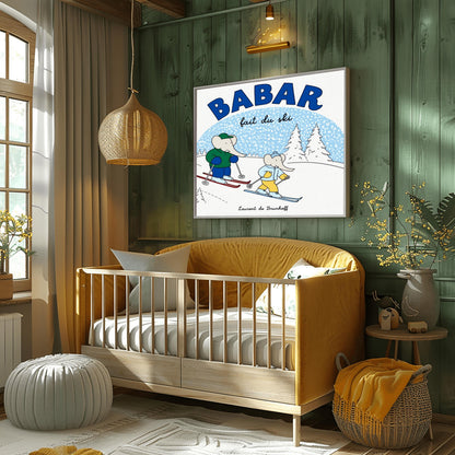 A horizontal children's art print featuring two cartoon elephants skiing down a white hill from left to right. The larger elephant, Babar, is in a green jacket with red skis. The smaller elephant is in a light blue jacket with blue skis. A large blue arch in the background represents a sky filled with white snow. Bold blue text at the top reads "BABAR" and script text below it says "fait du ski." The name "Laurent de Brunhoff" is centered at the bottom.