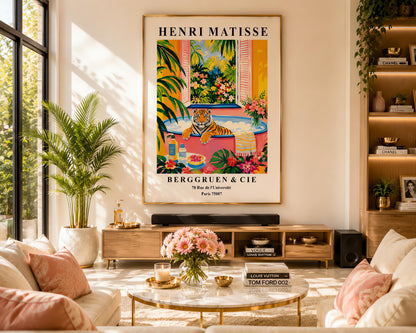 A vertical minimalist fine art exhibition poster in the style of Henri Matisse, featuring a wide white border layout. In the center, a simple black line drawing illustrates a tiger in a crouching, stalking pose. The illustration is set against a vibrant mustard yellow background block, framed by flat paper-cut abstract shapes including a royal blue coral leaf on the left and a terracotta red shape on the right against a solid white backdrop.
