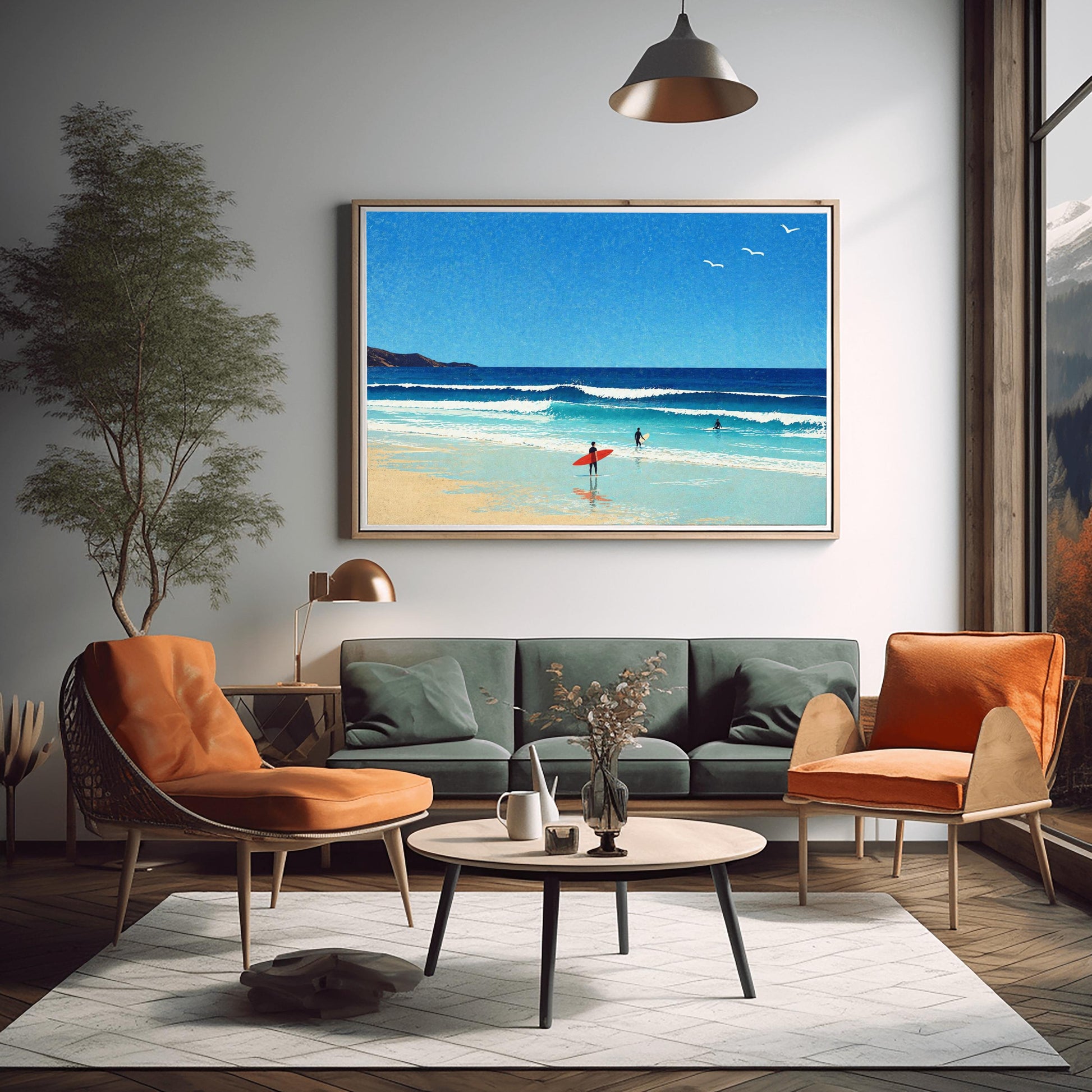 A horizontal minimalist art print of a bright beach day. A vast blue sky with three small white birds in flight sits above a turquoise ocean with gentle white waves. In the foreground, a sandy beach meets the water. A lone surfer in a black wetsuit holds a bright red surfboard on the shore, while two other surfers are further out in the water. A dark cliff is visible on the far left horizon. The style is clean and graphic with a subtle paper texture.