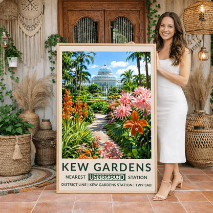 A vertical retro London Underground travel poster for Kew Gardens on a wide cream border. The top image shows a sun-drenched exterior view of the historic white iron-and-glass Palm House dome under a bright blue sky with light clouds. A stone path in the center is flanked by a lush tropical garden featuring towering palm trees, a large prominent orange orchid blossom on the right alongside spiky pink flowers, and tall orange torch lilies on the left.