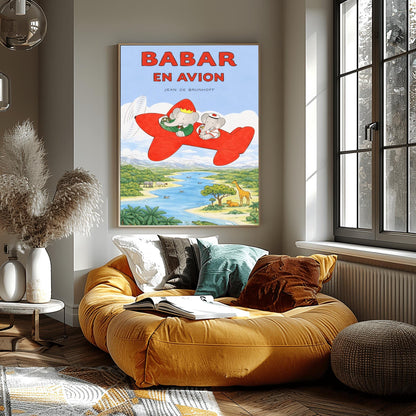 A vertical children's illustration poster titled "BABAR EN AVION" in large red letters. At the center is a bright red propeller plane flying through a blue sky with white clouds. King Babar, in a green suit and crown, and Queen Celeste, in a white sailor-style hat, are sitting in the cockpits. Below them is a winding blue river and a green savanna with a giraffe, a lion, a hippopotamus, and palm trees. The name "Jean de Brunhoff" is at the top.