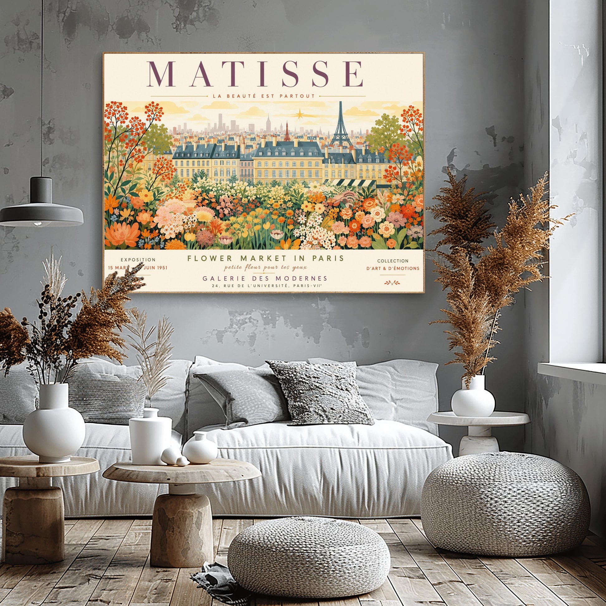 A French art exhibition poster titled "MATISSE" across the top. The central illustration shows a sprawling field of dense, colorful wildflowers in shades of orange, yellow, and white. In the background, classic Parisian buildings and the silhouette of the Eiffel Tower stand under a soft yellow sky. The text at the bottom reads "Flower Market in Paris, Galerie des Modernes, 24, Rue de l'Université, Paris."