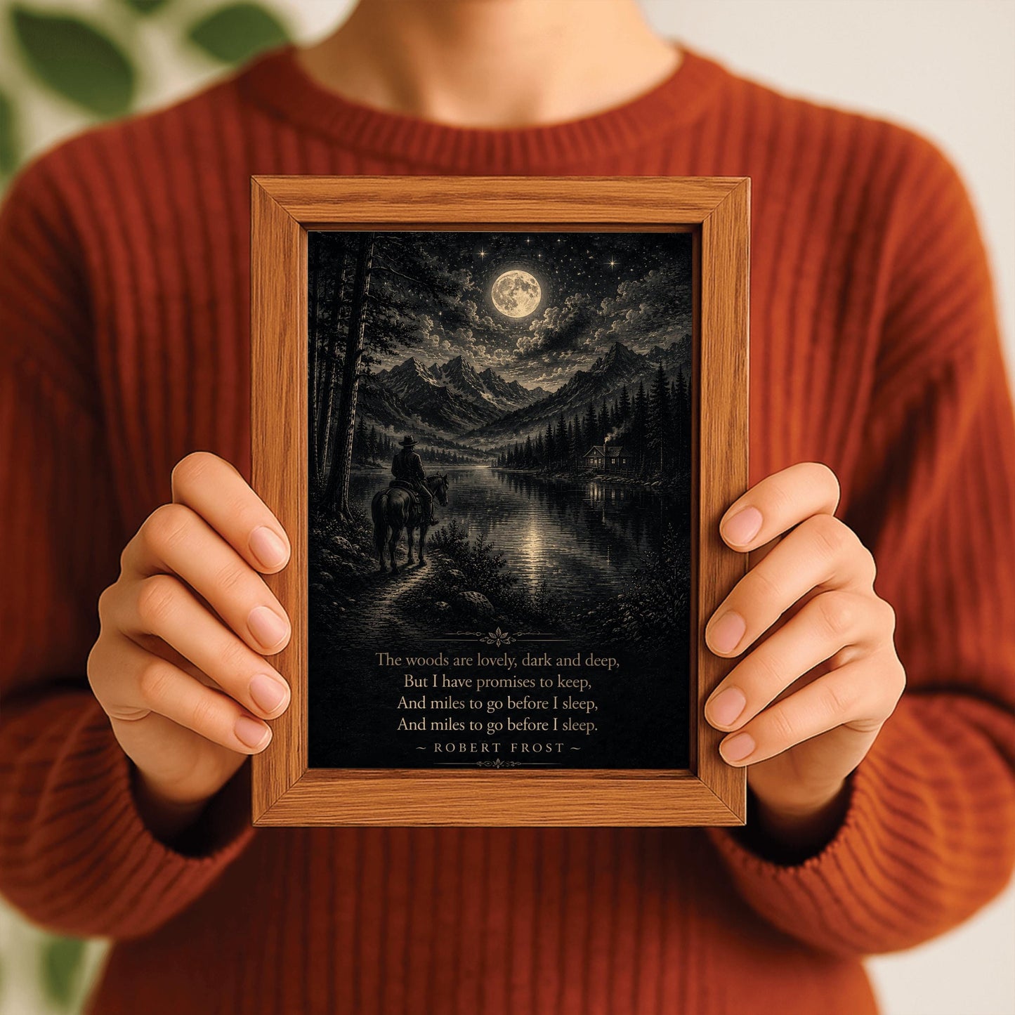 A detailed forest green and cream woodcut-style illustration of a rider on a horse looking across a lake toward a small cabin and distant mountains under a starry sky. The bottom of the image features the final four lines of Robert Frost's poem "Stopping by Woods on a Snowy Evening".