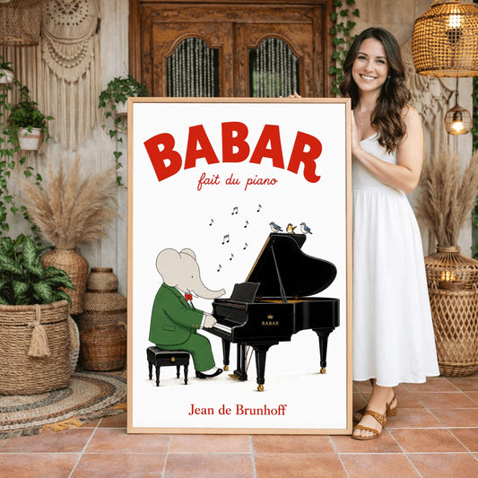 A vertical fine art exhibition poster featuring a classic illustration of Babar the Elephant by Jean de Brunhoff, as seen in Screenshot 2026-05-28 at 19.58.40.png. Set within a wide white border on a textured off-white background, the elephant is shown in a green suit and red bowtie sitting on a stool playing a black grand piano. Three small birds sit on the open piano lid under floating musical notes. Bold red text at the top reads "BABAR fait du piano".