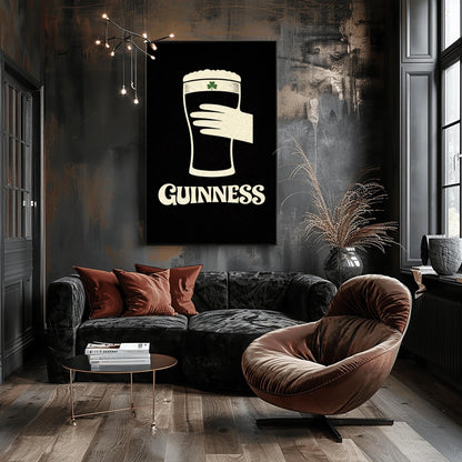 A vertical minimalist graphic design on a textured black background. A cream-colored hand is shown holding a pint of Guinness stout, with the glass itself created out of negative space. A small green shamrock is on the foam. The word "GUINNESS" is in cream text at the bottom.