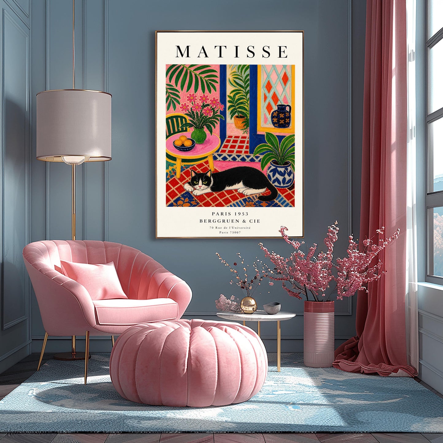 A vertical maximalist art print styled as a Henri Matisse exhibition poster. A black and white tuxedo cat lies across an intricate red, orange, and blue patterned rug. The room features textured bubblegum pink walls and a cobalt blue door frame. To the left, a pink table holds a bowl of oranges and a green vase with pink flowers. To the right, a blue and white floral pot holds a green plant. A diamond-patterned window is visible in the background.