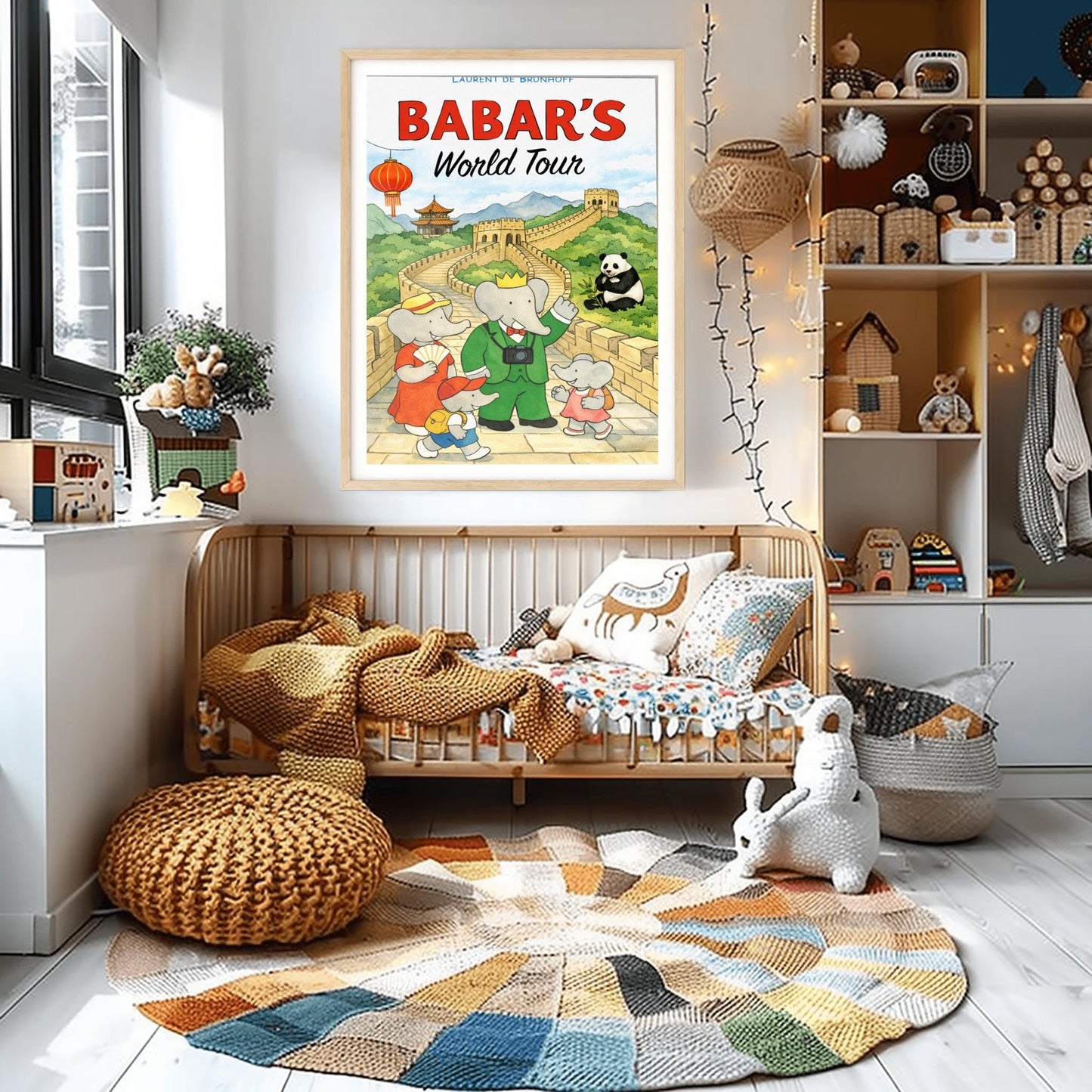 A vertical children's illustration poster titled "BABAR'S World Tour" in red and black letters. King Babar, wearing a green suit and a camera around his neck, stands on the Great Wall of China with his family. The wall curves through green mountains toward a pagoda in the distance. A giant panda sits in the grass to the right, and a red Chinese lantern hangs on the left. The name "Laurent de Brunhoff" is at the top.