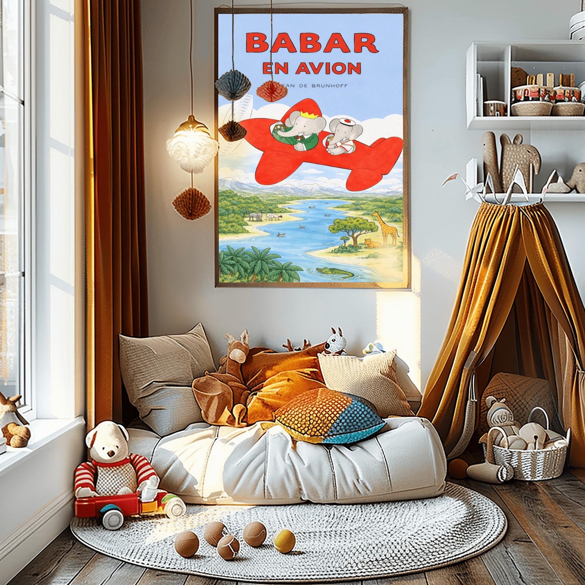 A vertical children's illustration poster titled "BABAR EN AVION" in large red letters. At the center is a bright red propeller plane flying through a blue sky with white clouds. King Babar, in a green suit and crown, and Queen Celeste, in a white sailor-style hat, are sitting in the cockpits. Below them is a winding blue river and a green savanna with a giraffe, a lion, a hippopotamus, and palm trees. The name "Jean de Brunhoff" is at the top.