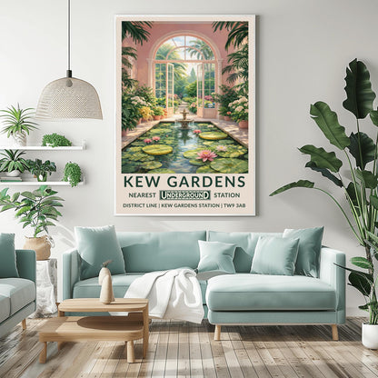 A vertical vintage travel poster for Kew Gardens. The scene is an interior view of a pink-walled conservatory featuring a long rectangular pond filled with lily pads and pink water lilies. A tiered stone fountain stands in the water. Large arched glass doors are open in the center, revealing a sun-drenched garden path lined with flowers and palm trees. The bottom features a cream border with bold green text: "KEW GARDENS" and "NEAREST UNDERGROUND STATION" with District Line details.
