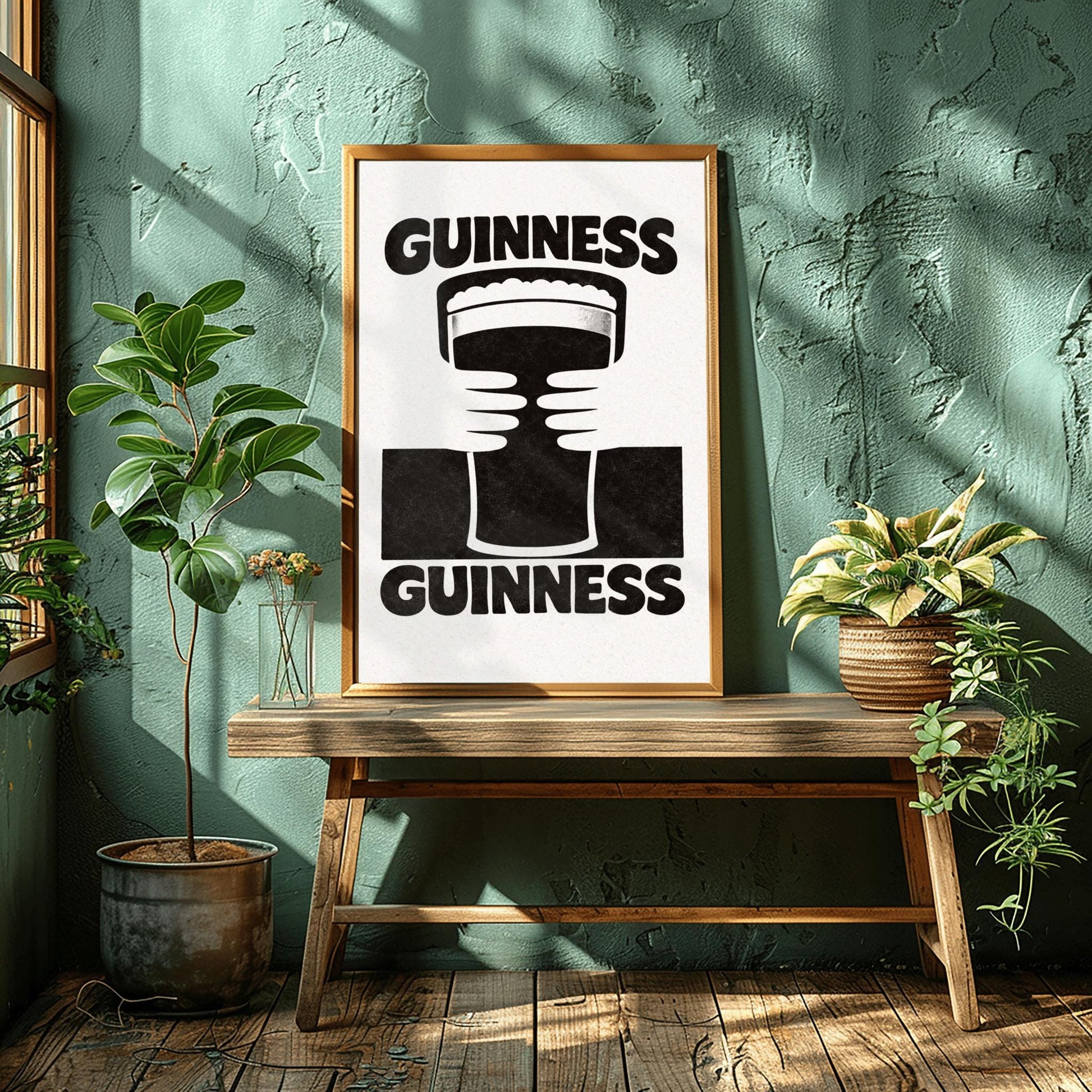 A vertical black and white minimalist graphic. Two white hands hold a central pint of Guinness from both sides. The word "GUINNESS" appears in bold black text both at the top and the bottom of the cream-colored background.