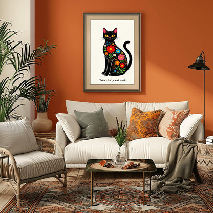 A vertical minimalist art print of a sleek black cat sitting upright, facing forward. The cat's body is filled with colorful folk-art style flowers in red, blue, orange, and yellow with green leaves. The cat has large yellow eyes and a small pink nose. Below the cat, the French phrase "Très chic, c'est moi." is written in a black serif font. The entire image is set against a textured off-white background.