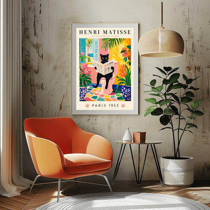 A vertical gallery poster on a cream background titled "HENRI MATISSE - LES COULEURS DE LA JOIE" in black and pink font. The central image shows a sleek black cat with bright yellow eyes sitting on a pastel pink toilet, reading a French newspaper titled "LE JOURNAL". The bathroom features an open window with blue shutters looking out at a beach, ocean, and palm trees. The room is decorated with lush green plants, potted orange flowers, and a colorful mosaic stone floor.